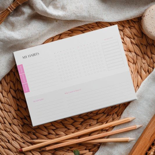 Pink Weekly habit tracker notepad with  tear-off pages